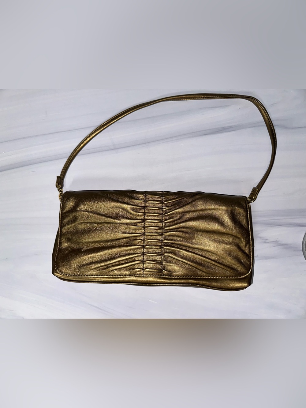 Apostrophe gold clutch with small shoulder strap great condition
